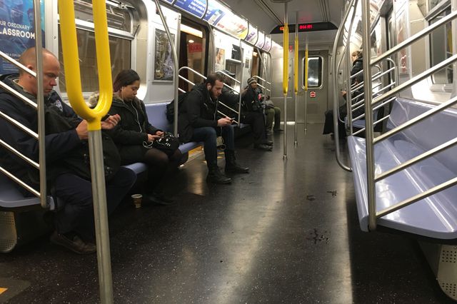 A mostly empty subway train in NYC on Friday, March 13th 2020.